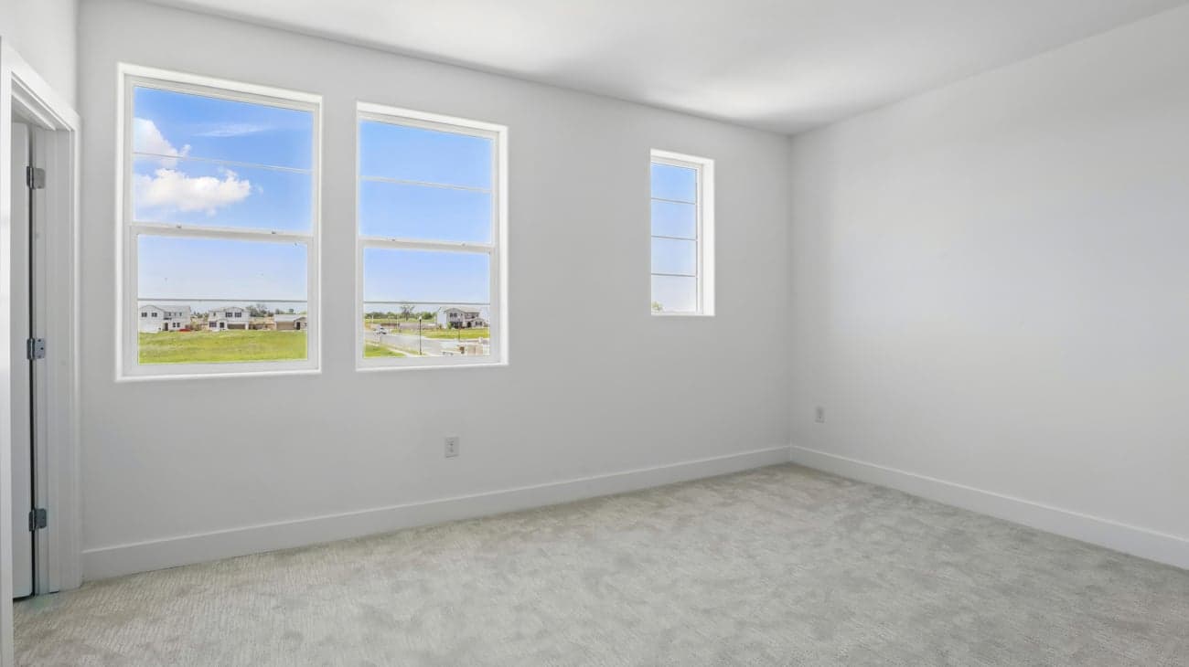 Bedroom 2 at Plan 5002, The Residences at Arbor Ranch